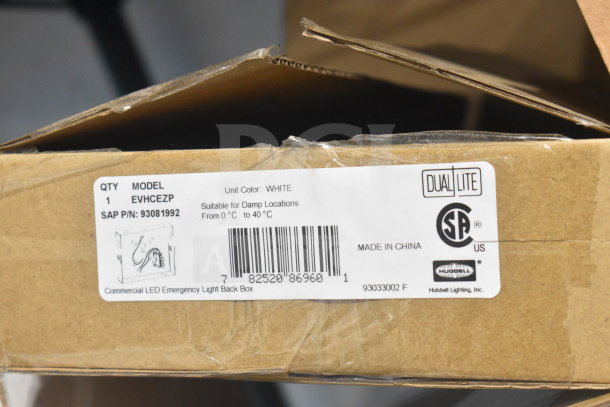 Auction lot of 19 items including DualLite Double Remote Head, LED Emergency Light, and Back Box. Box label details model EVHCEZP, suitable for damp locations, color white, made in China.