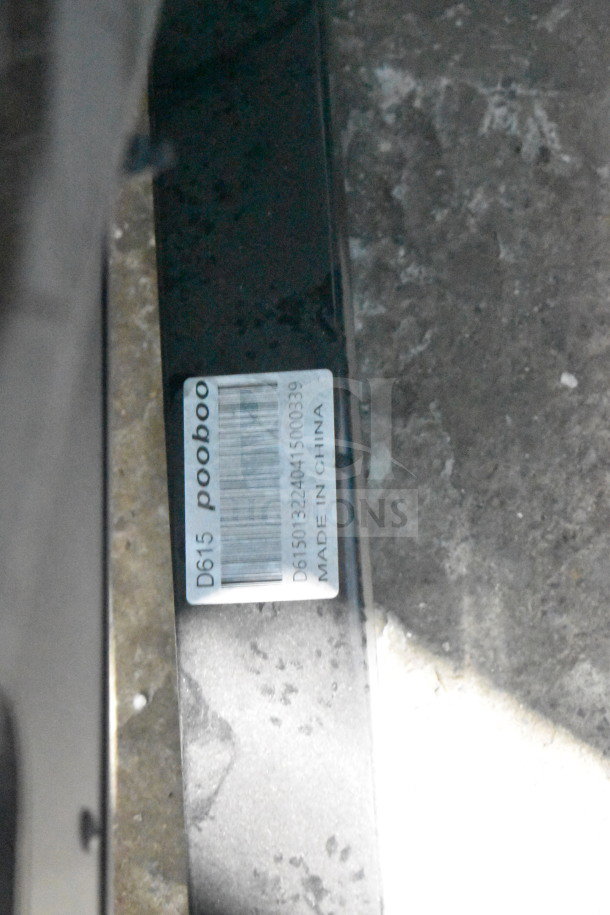 Barcode and label showing model "D615" and brand "pooboo" on the stationary exercise bicycle. Made in China.