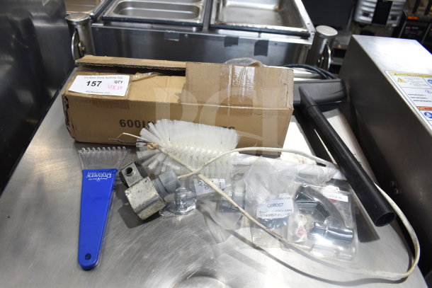 10 items including a brush, scraper, support rod assembly, and assorted parts in cardboard box, marked 600IB1918S. Auction quantity 10.