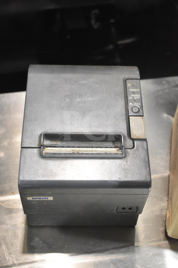 Epson M244A receipt printer, black, used condition, features control panel with error and paper out indicators.