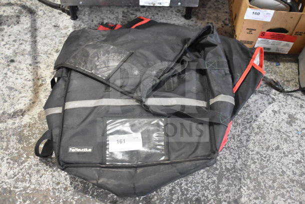 Four assorted hot food catering carrying bags, black with red accents, reflective strips, visible label "hometovate," used condition.