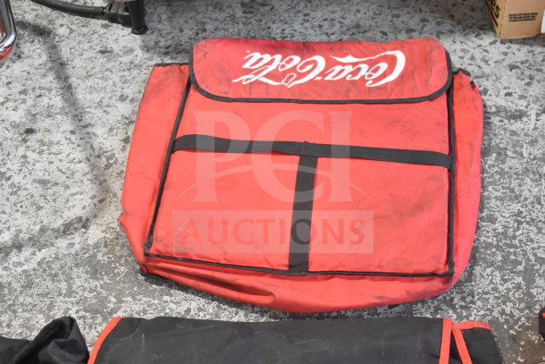 Red hot food catering carrying bag with Coca-Cola branding, slightly worn condition.