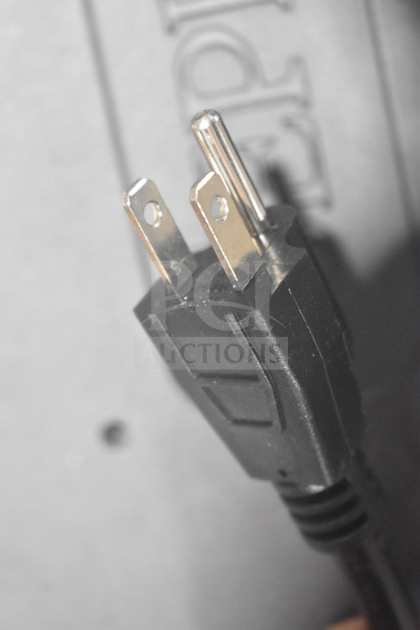 Sephra SERTWFL01 Commercial Waffle Maker plug, close-up view, 110-120 Volts, for countertop use.