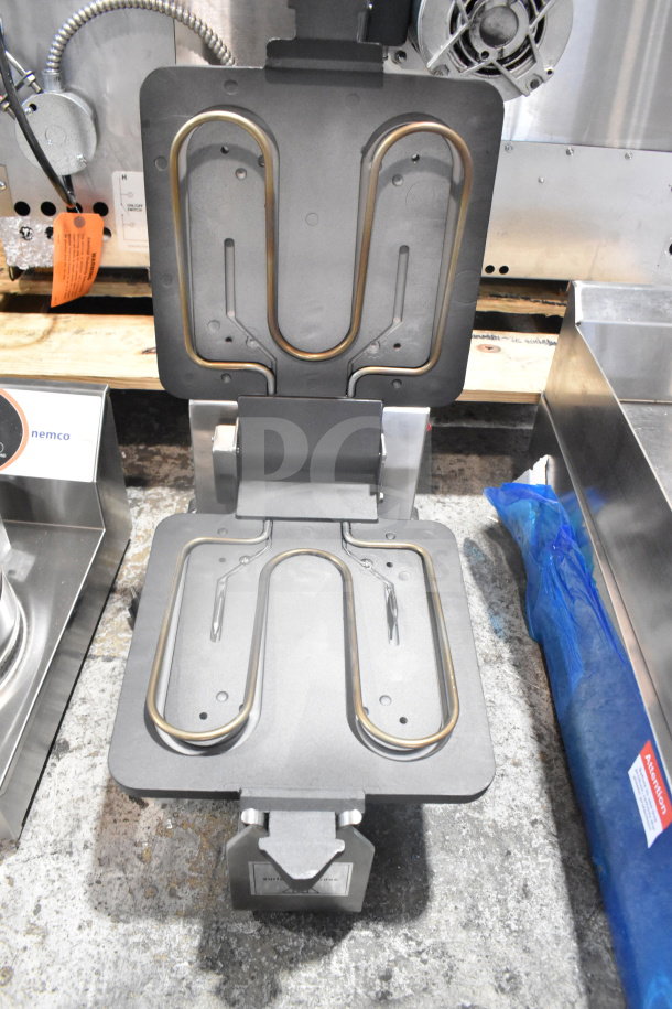 Sephra SERTWFL01 commercial countertop waffle maker, 110-120 volts, open view showing non-stick plates, used condition.