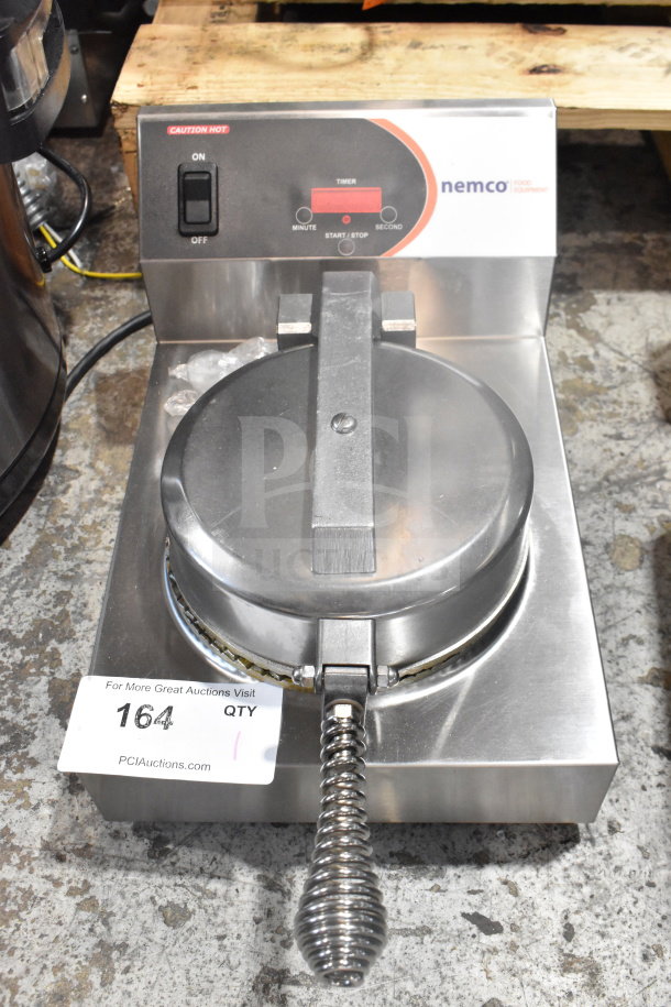 Nemco 7030A Commercial Waffle Maker, stainless steel, with timer controls. 120V, 1 Phase. "Caution Hot" label visible.