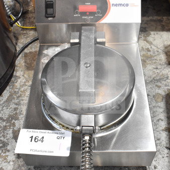 Nemco 7030A Commercial Waffle Maker, stainless steel, with timer controls. 120V, 1 Phase. "Caution Hot" label visible.