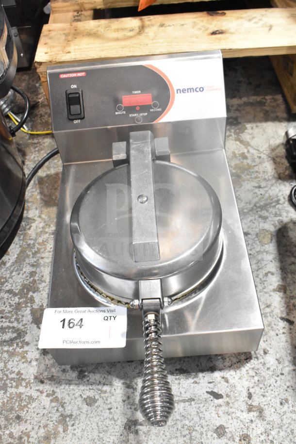 Nemco 7030A Commercial Waffle Maker, countertop model, 120V, 1 phase, stainless steel, with visible control panel and coiled handle.