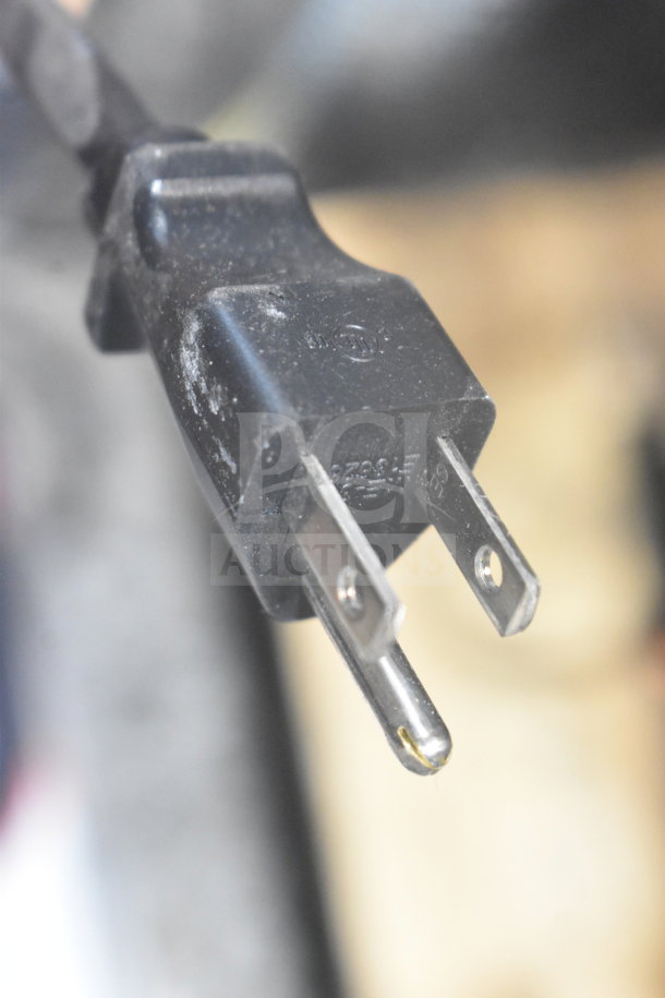 A close-up of the power plug for the Nemco 7030A commercial waffle maker, designed for 120V, 1 Phase power.
