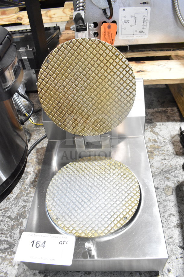 2026 Nemco 7030A commercial waffle maker, stainless steel, 120 volts, 1 phase. Clean appearance with grid plates shown.