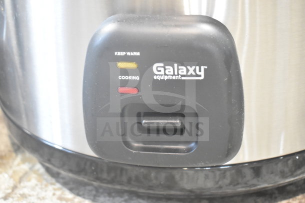 Brand new Galaxy 177RCSG60 electric rice cooker, scratch and dent. Features keep warm and cooking indicators. 120V, 1 Phase.