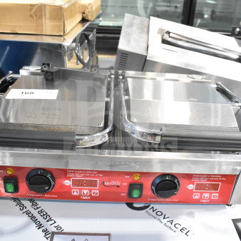 Brand new Avantco 177PG400T commercial dual panini grill with timer, grooved plates, 19 5/8" x 9 1/8" surface, 120V.