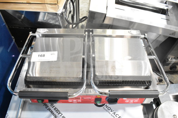 Avantco 177PG400T Commercial Dual Panini Grill, grooved plates, timer, 19 5/8" x 9 1/8" surface, 120V. New, scratch and dent condition.
