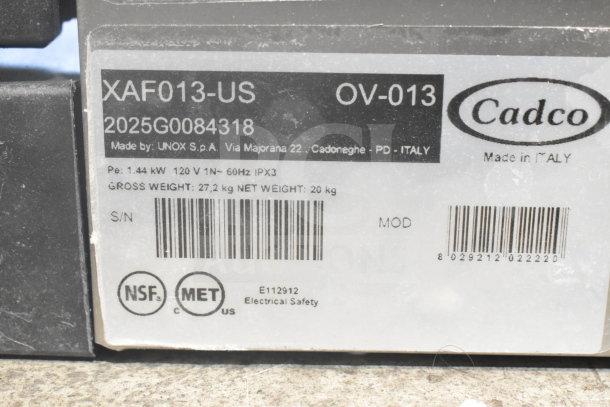 2025 Cadco OV-013 XAF013-US convection oven label, indicating electric model, 120V, missing door, made by UNOX S.p.A.