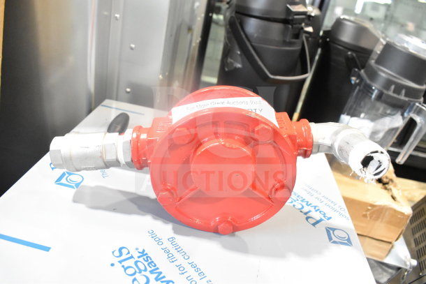 Red and chrome finish unit with visible piping and fittings, in good condition. No visible brand markings.