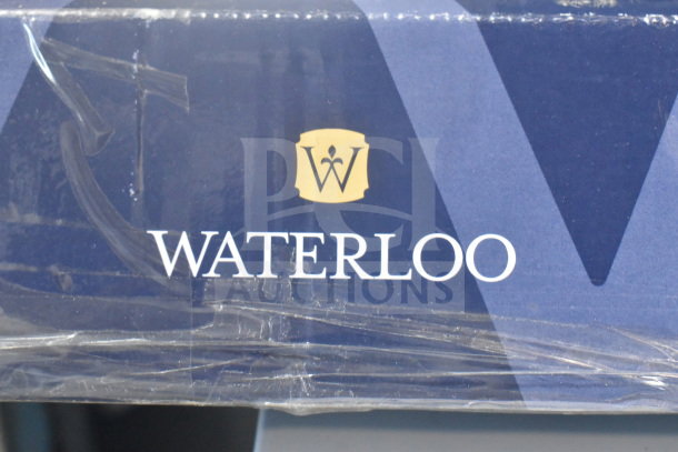 BRAND NEW SCRATCH AND DENT 750PRAXF Waterloo pre-rinse assembly box with logo.