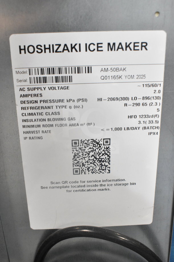 Hoshizaki AM-50BAK ice maker label detailing model, voltage, pressure, refrigerant type, and QR code for service info.