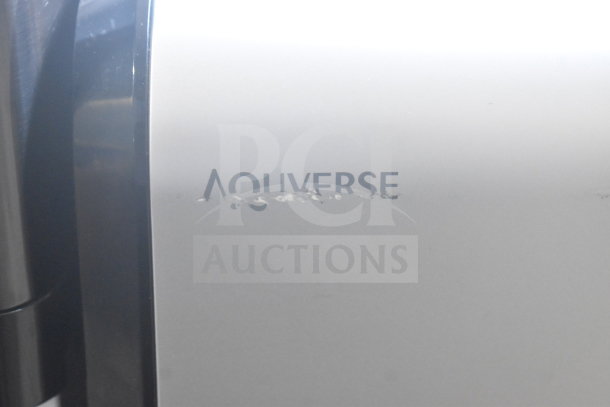 Aquaverse A6500 floor water dispenser close-up. Displays brand logo. 110-120 volts, 1 phase. Visible surface wear.