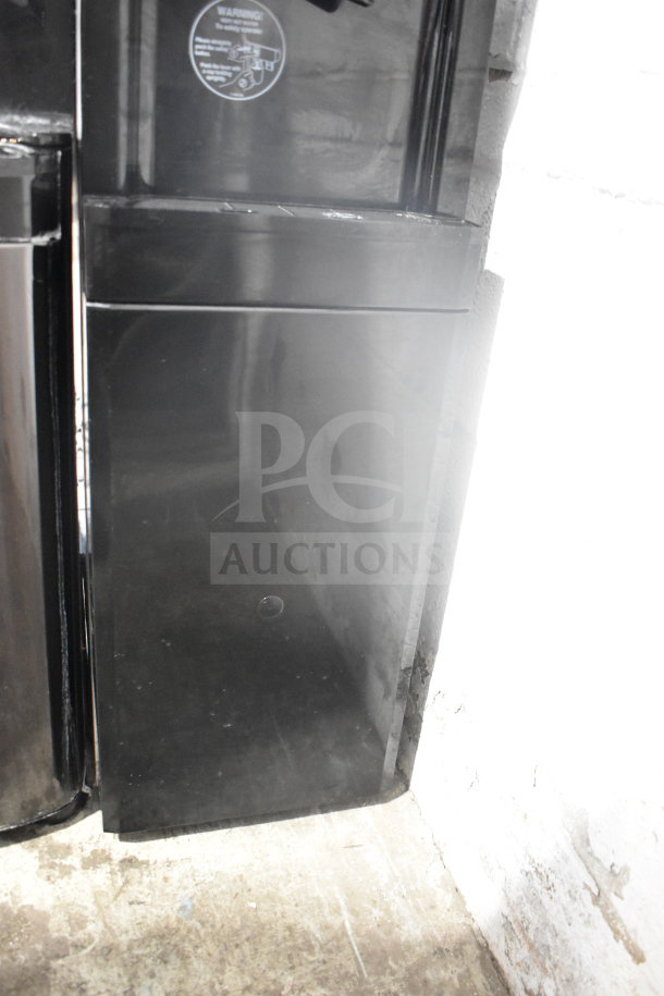 Aquaverse A6500 floor style water dispenser, black finish, 110-120V, 1 Phase, visible wear on exterior surface.