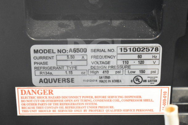 Aquaverse A6500 water dispenser label showing model, serial number 151002578, 110-120V, R134a refrigerant. Made in Korea. UL listed.