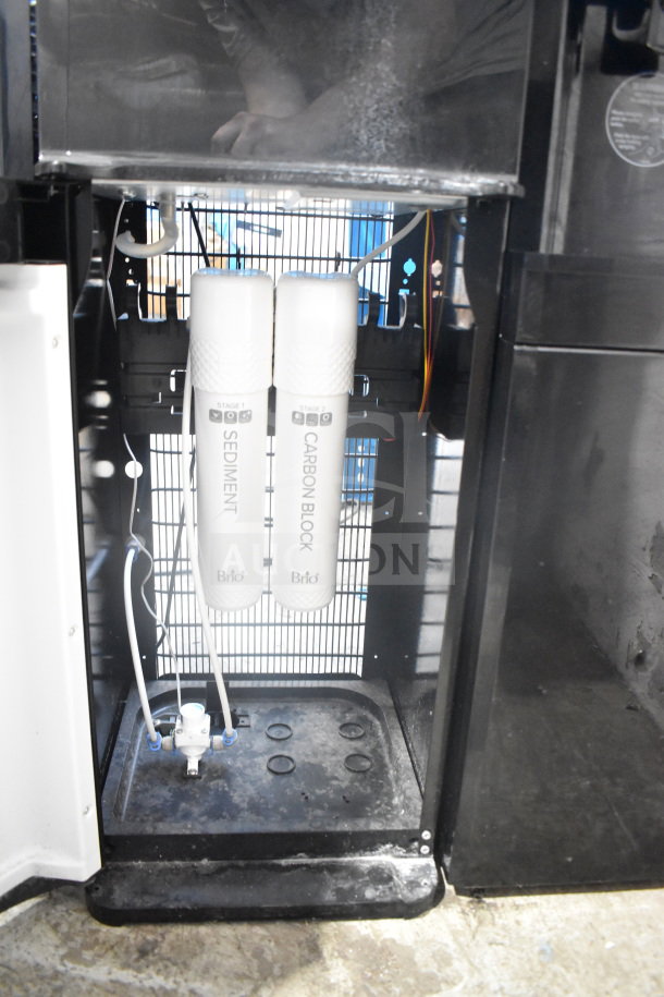 Brio CLPOU520UVF2BLK floor water purifier, 110-120V, features sediment and carbon block filters, good condition.