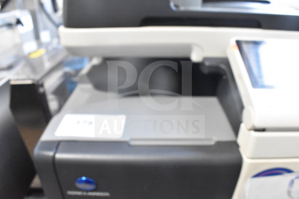 Konica Minolta Bizhub C3350 floor style scanner copier printer with control panel. Visible label shows model name.