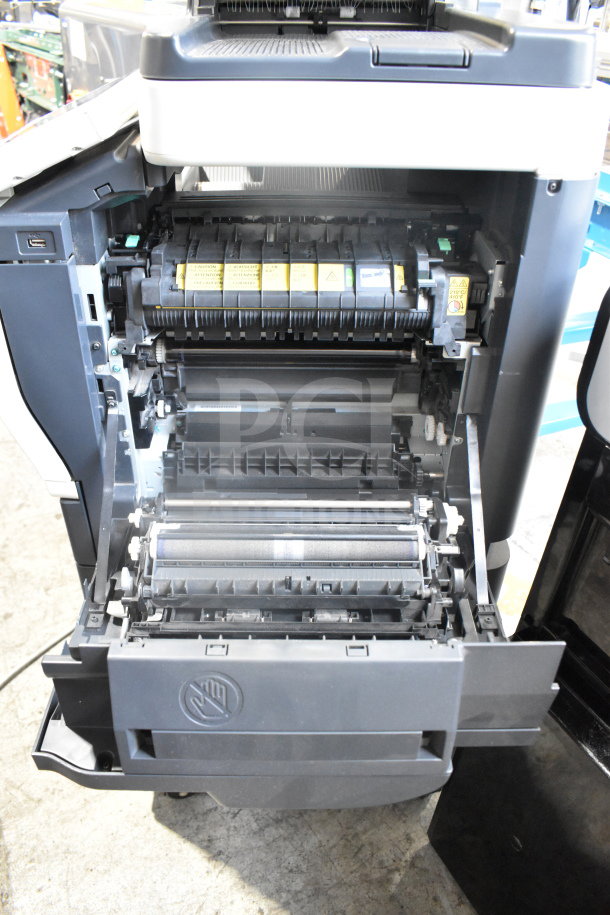 Konica Minolta Bizhub C3350 printer with open front panel, showcasing internal mechanisms and toner cartridges, in good condition.