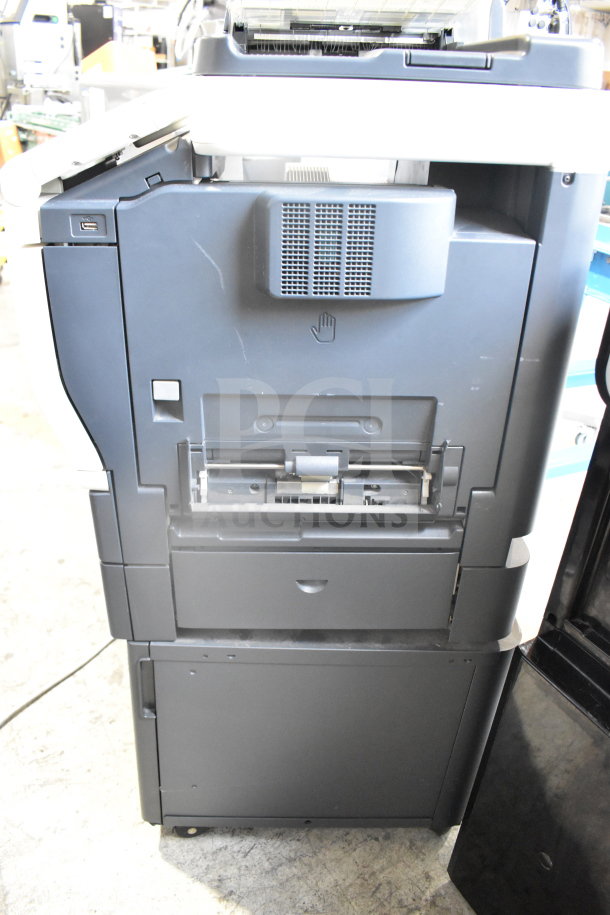 Konica Minolta Bizhub C3350 floor-style scanner, copier, printer, in used condition with visible wear.