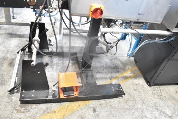 Advanced Poly Packaging T-1000 Bagger, 117/220V. Features metal frame, wiring, components. Used condition.