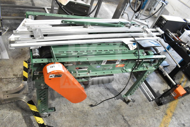 Roach Floor Style Conveyor, green metal frame, 115 volts, 1 phase, visible labels, good condition.