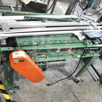Roach Floor Style Conveyor, green metal frame, 115 volts, 1 phase, visible labels, good condition.