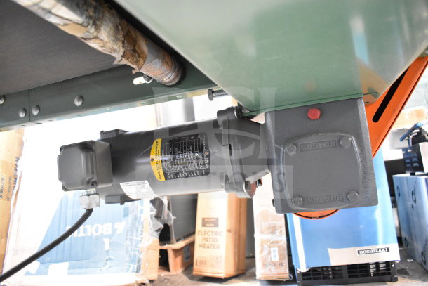 Roach Floor Style Conveyor, 115V, 1 Phase, visible motor and attachments, excellent condition.