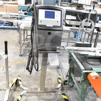 Videojet 1620 inkjet printer, floor style, 100-240V, 1 phase, with control panel, standing on a metal base in a warehouse.