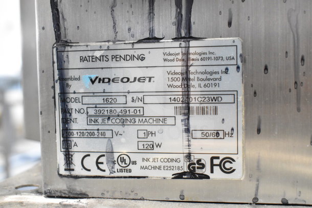Videojet 1620 inkjet printer label showing model, serial number, voltage, and compliance markings.
