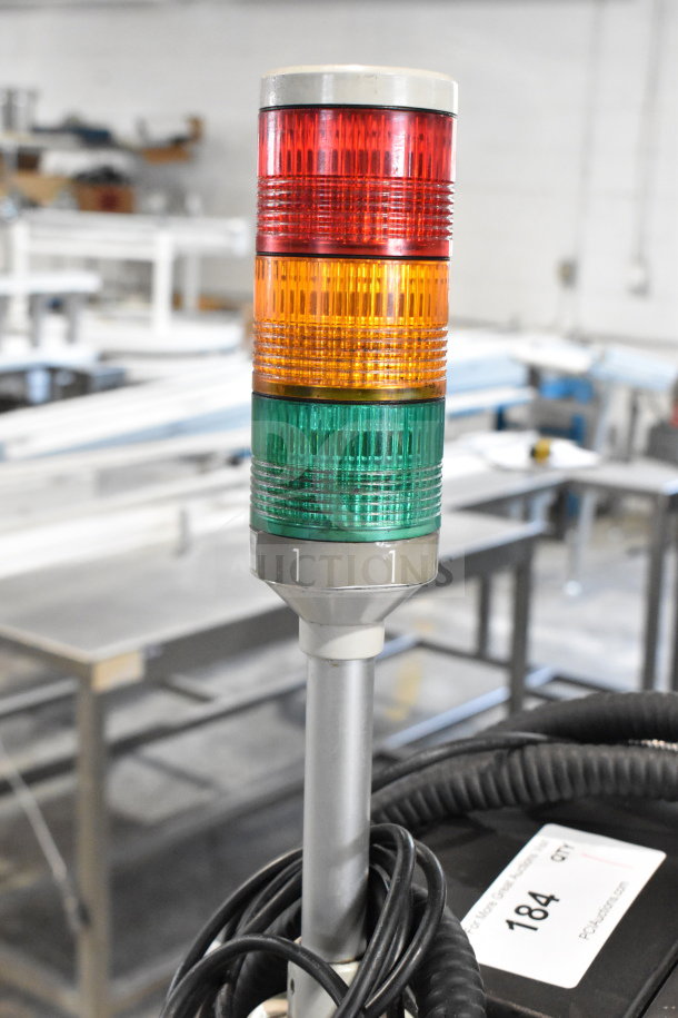 Videojet 1610 Inkjet Coding Machine, floor style, visible control tower, wiring, and base, model and voltage details tagged.