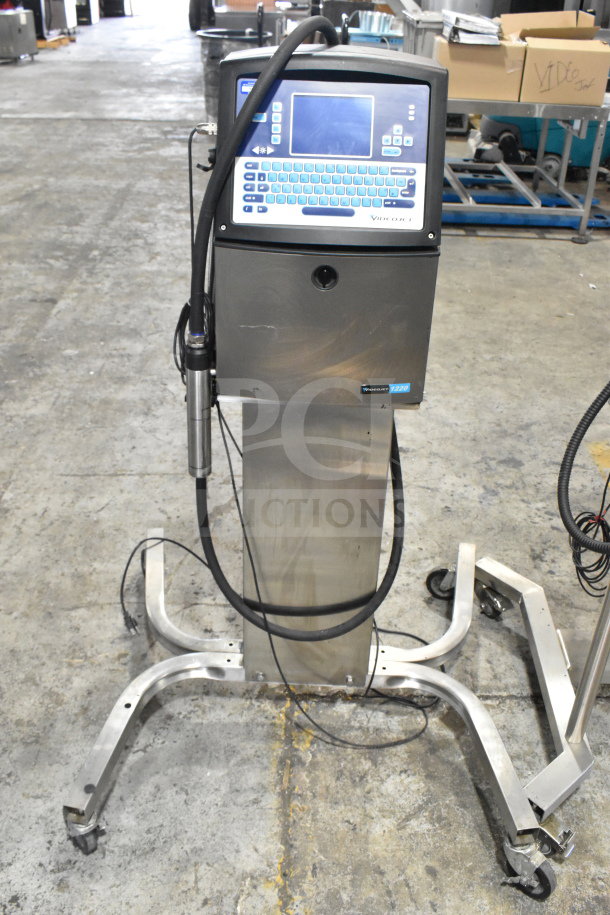 Videojet 1220 Floor Style Inkjet Coding Machine, stainless steel, 100-120/200-240V, 1 Phase, with control panel and display.