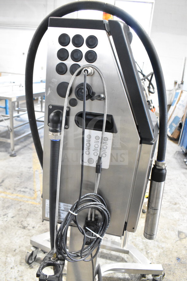 Videojet 1220 Floor Style Inkjet Coding Machine, 100-120/200-240 Volts, 1 Phase, with control panel and cables attached.