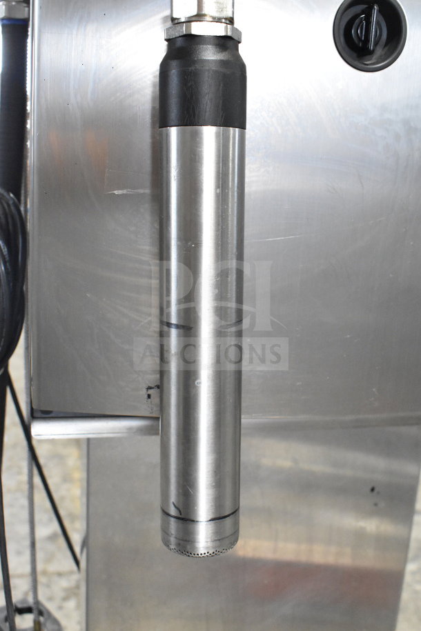 Videojet 1220 inkjet coding machine, stainless steel body. Compatible with 100-240V, 1 phase. Rugged industrial design.