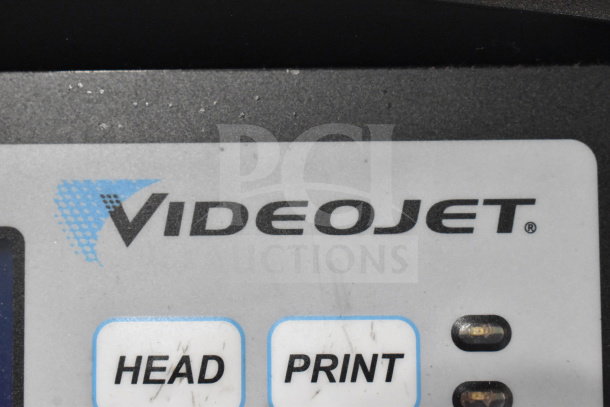 Videojet 1620 inkjet coding machine control panel with "HEAD" and "PRINT" buttons visible.
