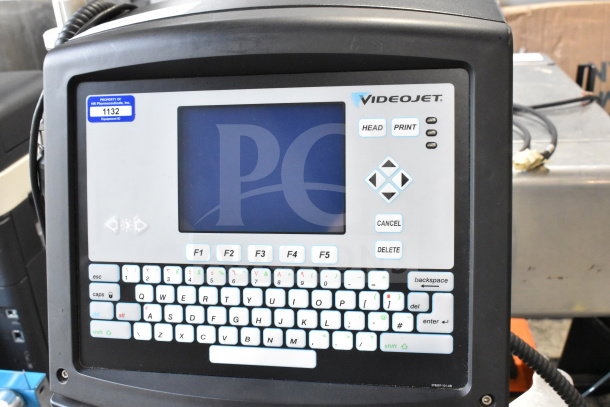 Videojet 1610 inkjet coding machine, floor style, 100-240V, 1 phase. Features keyboard, screen, and operational buttons.
