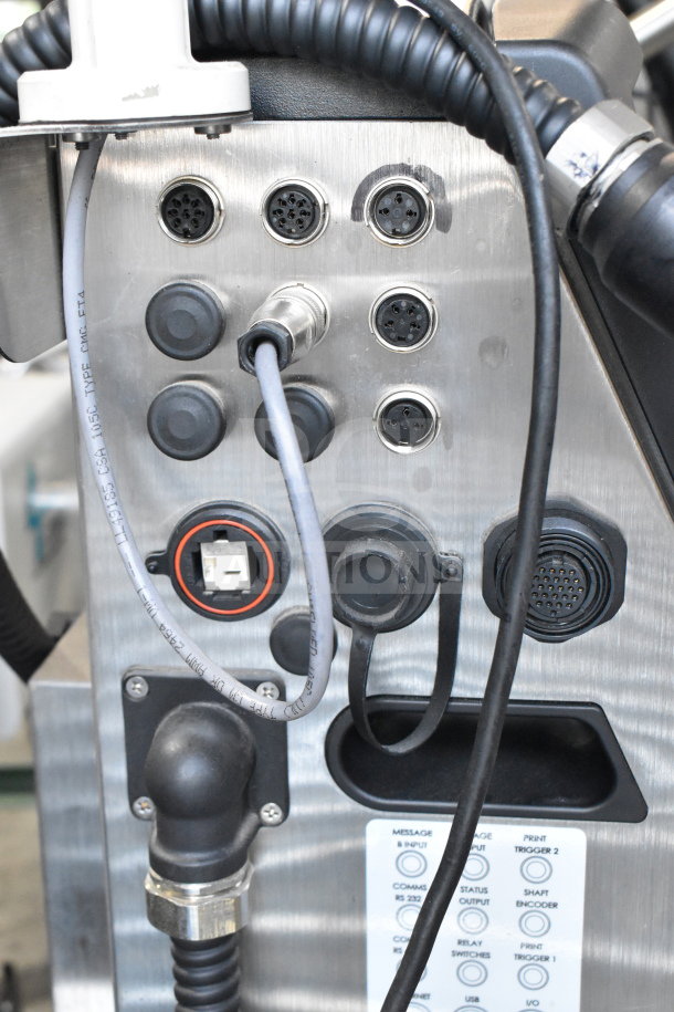 Videojet 1610 inkjet coding machine panel; multiple connection ports visible. Model 1610, 100-120/200-240 volts, 1 phase.