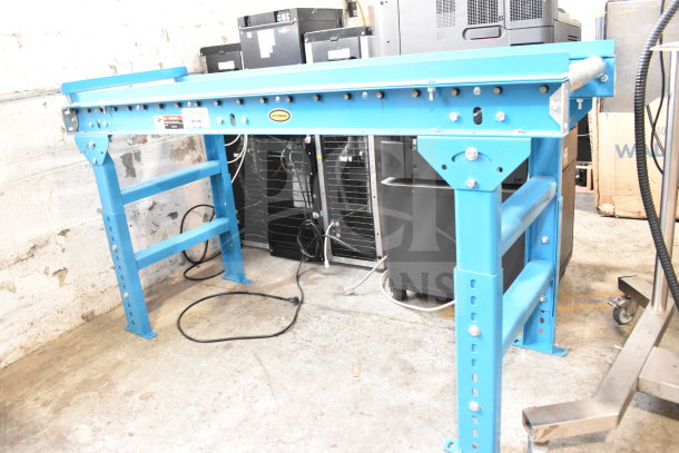 Hytrol Floor Style Roller Conveyor, blue, sturdy steel frame, roller mechanism intact, excellent condition, clear Hytrol branding.