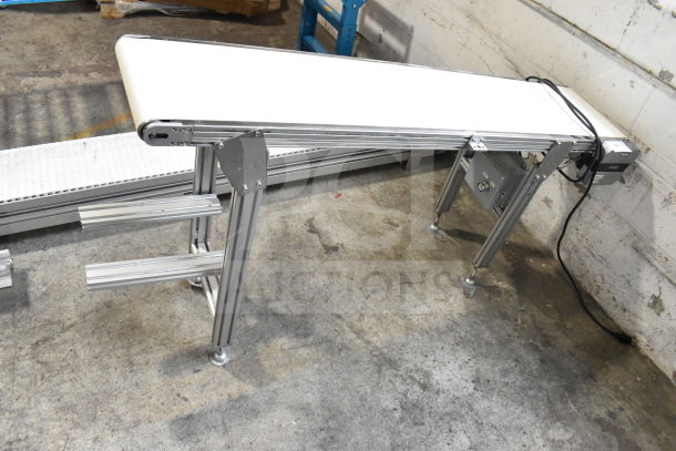 MiSumiFloor Style Conveyor, 115 Volts, 1 Phase, aluminum frame, adjustable legs, good condition.