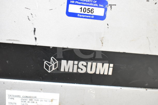 MiSumiFloor style conveyor, 115 volts, 1 phase, visible label with equipment ID 1056.