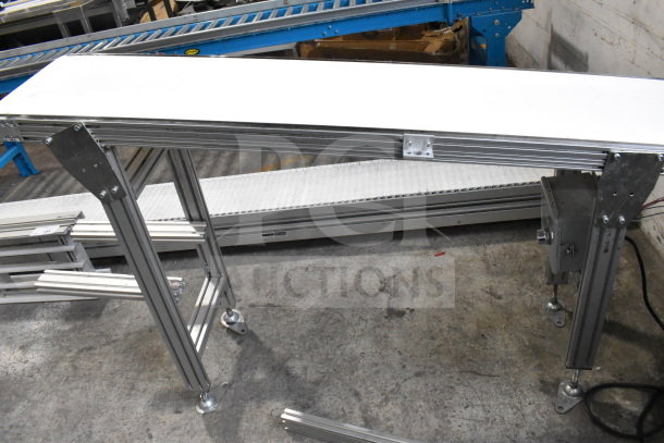 MiSumiFloor Style Conveyor, 115 Volts, 1 Phase, sturdy metal frame, adjustable legs, in used condition.