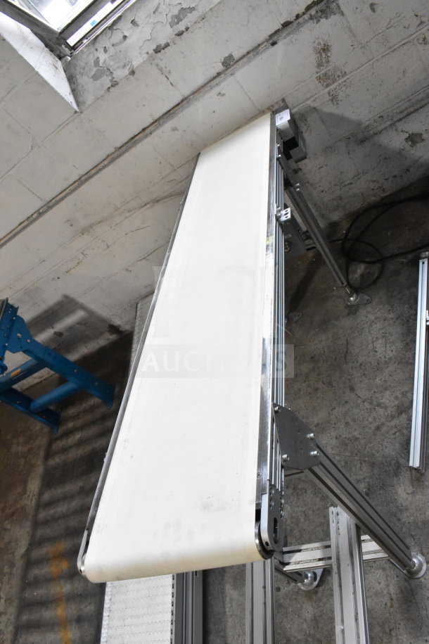 MiSumiFloor Style Conveyor, 115 Volts, 1 Phase. Metal frame, white belt, excellent condition, industrial use.