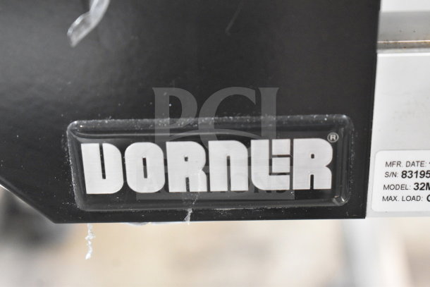 2020 Dorner 22MV1122B floor-style conveyor with table, 115V, 1-phase. Features Dorner logo and model details.