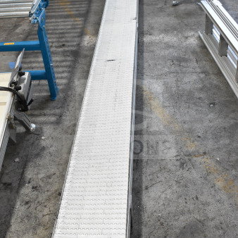 Dorner 32MTEM12 Conveyor, white segmented belt, sturdy frame, in good condition, shows minimal wear, ID tag labeled "192."