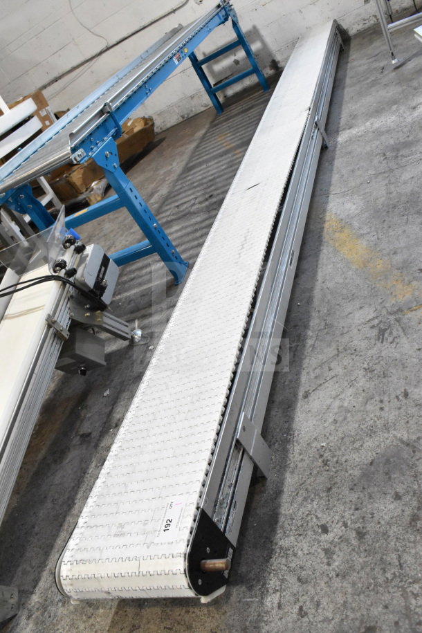 Dorner 32MTEM12 conveyor with white belt, in good condition, featuring metal frame and industrial-grade build.