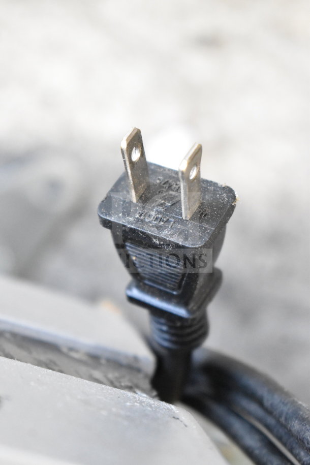 MiSumi CVGC-300 Conveyor Belt plug, 115 Volts, 1 Phase. Visible wear on plug indicating usage.