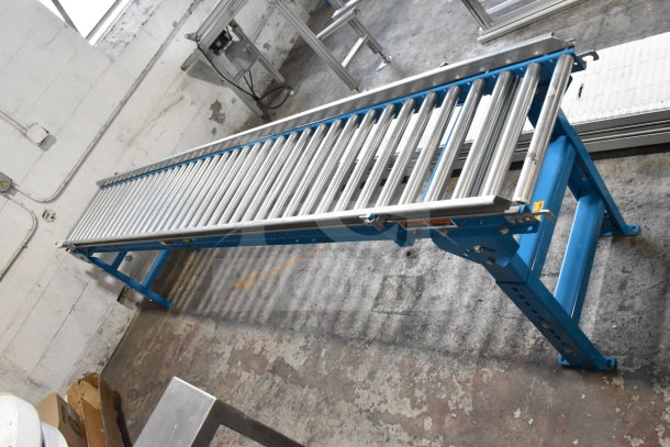 Hytrol Floor Style Roller Conveyor, blue frame, stainless steel rollers, industrial use, excellent condition.